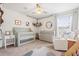 Cozy Bedroom with neutral carpet, grey colored furniture, light color walls, and lots of natural light at 1532 Roustabout Way, Charleston, SC 29414