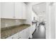 Kitchen with granite countertops, stainless steel appliances, and modern backsplash at 1532 Roustabout Way, Charleston, SC 29414