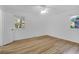 Bright bedroom featuring hardwood floors and windows at 1595 Dickens St, Charleston, SC 29407