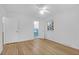Neutral bedroom featuring a ceiling fan, hardwood floors, and bathroom access at 1595 Dickens St, Charleston, SC 29407