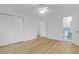 Bedroom featuring ceiling fan, hardwood floors, and bathroom access at 1595 Dickens St, Charleston, SC 29407