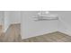 Modern kitchen showcasing new luxury vinyl plank flooring, an open concept and lots of light at 1595 Dickens St, Charleston, SC 29407