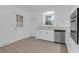 Clean kitchen featuring white cabinetry, stainless steel appliances and vinyl flooring at 1595 Dickens St, Charleston, SC 29407