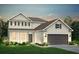 Charming two-story home with a symmetrical facade, well-manicured lawn, and a two-car garage at 163 Royal Cainhoy Way, Huger, SC 29450