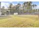 Large backyard with a shed, grill, and partially covered deck, great for entertaining and relaxing at 1633 Pimlico Blvd, Moncks Corner, SC 29461