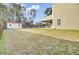 A large backyard with an outdoor shed, fire pit, and a covered deck offer great outdoor living at 1633 Pimlico Blvd, Moncks Corner, SC 29461