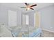 Comfortable bedroom with ceiling fan, carpet, and two closets, offering style and functionality at 1633 Pimlico Blvd, Moncks Corner, SC 29461