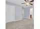 Cozy bedroom with soft carpet and a ceiling fan to keep you cool on those hot summer nights at 1633 Pimlico Blvd, Moncks Corner, SC 29461