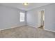 Bedroom features a window and neutral walls, complete with plush carpet for a comfortable and inviting atmosphere at 1633 Pimlico Blvd, Moncks Corner, SC 29461