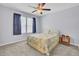 Bedroom featuring dark curtains, carpet and ceiling fan, creating a cozy and relaxing atmosphere at 1633 Pimlico Blvd, Moncks Corner, SC 29461