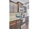 The kitchen features granite countertops, a stainless steel range, and dark wood cabinets at 1633 Pimlico Blvd, Moncks Corner, SC 29461