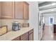 Kitchen nook area with custom cabinets, granite countertops, and stainless steel appliances at 1633 Pimlico Blvd, Moncks Corner, SC 29461