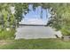 Scenic lake view framed by lush greenery with a glimpse of blue sky above at 1633 Pimlico Blvd, Moncks Corner, SC 29461