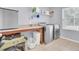 Bright laundry room with modern appliances and counter space for folding and organizing clothes at 1633 Pimlico Blvd, Moncks Corner, SC 29461