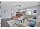 Open-concept living room with hardwood floors, recessed lighting, and neutral paint colors at 1633 Pimlico Blvd, Moncks Corner, SC 29461