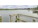 A tranquil view of the waterfront from a weathered pier, offering serene relaxation at 1633 Pimlico Blvd, Moncks Corner, SC 29461