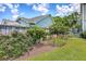 Spacious backyard with privacy fence, mature trees and landscaped garden beds at 1644 Fishbone Dr, Johns Island, SC 29455