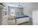 This bedroom offers a ceiling fan and a beautifully decorated white bed at 1644 Fishbone Dr, Johns Island, SC 29455