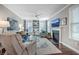 Inviting living room featuring a fireplace, built-in shelving, and a cozy seating arrangement at 1644 Fishbone Dr, Johns Island, SC 29455