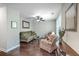 Relaxing living room featuring hardwood floors, comfortable seating, and a bright, airy ambiance at 1644 Fishbone Dr, Johns Island, SC 29455