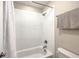 The shower offers a white subway tile surround, sleek fixtures, and a shower curtain at 1644 Fishbone Dr, Johns Island, SC 29455