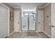 The shower has glass doors, a bench, and white marble tile surround at 1644 Fishbone Dr, Johns Island, SC 29455