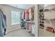 Spacious walk-in closet featuring custom shelving and ample storage for clothes and accessories at 1644 Fishbone Dr, Johns Island, SC 29455