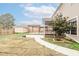 Spacious backyard features a pergola, screened-in patio, fresh grass and a storage shed at 173 Cypress Forest Dr, Moncks Corner, SC 29461