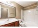 Bathroom with single sink vanity, mirror, toilet, and shower/tub combo at 173 Cypress Forest Dr, Moncks Corner, SC 29461