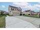 Two-story home with a large driveway leading to the garage, complemented by a well-kept lawn and mature landscaping at 173 Cypress Forest Dr, Moncks Corner, SC 29461