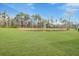 Expansive backyard featuring a pond, providing a serene and natural setting at 1756 Timmons St, Mount Pleasant, SC 29466
