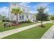 Attractive two-story home with a lush green lawn and mature landscaping at 1756 Timmons St, Mount Pleasant, SC 29466
