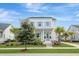 Charming two-story home with manicured lawn, lovely landscaping, and inviting front porch at 1756 Timmons St, Mount Pleasant, SC 29466