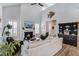 Bright living room with fireplace, TV, and stylish coastal accents at 1756 Timmons St, Mount Pleasant, SC 29466
