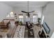 Open-concept living room boasts a fireplace, stylish furnishings, and abundant natural light at 1756 Timmons St, Mount Pleasant, SC 29466