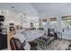 Open-concept living room with modern decor flowing into kitchen and dining areas at 1756 Timmons St, Mount Pleasant, SC 29466