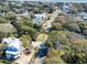 An aerial view of a charming neighborhood featuring a new home with a pristine white exterior at 18 Wills Way, Isle of Palms, SC 29451