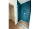 Bathroom under construction features a tiled shower with niche; doorway to another room at 18 Wills Way, Isle of Palms, SC 29451
