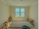 Bedroom featuring double windows and natural light at 18 Wills Way, Isle of Palms, SC 29451