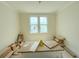 Bedroom featuring a bright window and neutral walls; construction materials present at 18 Wills Way, Isle of Palms, SC 29451