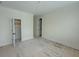 A spacious bedroom with neutral walls, trim, and doors to the closet and an ensuite bathroom at 18 Wills Way, Isle of Palms, SC 29451