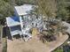 Rear of new home under construction, featuring a spacious covered patio, and an outdoor shower area at 18 Wills Way, Isle of Palms, SC 29451