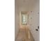 Hallway featuring detailed trim work, white walls and doors at 18 Wills Way, Isle of Palms, SC 29451
