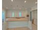 Future kitchen with new cabinets and countertops with lots of natural light at 18 Wills Way, Isle of Palms, SC 29451