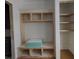 Mudroom area featuring custom built-in shelving with bench at 18 Wills Way, Isle of Palms, SC 29451