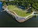 Picturesque aerial view of the neighborhood park featuring lush green spaces and scenic waterfront views at 1818 Orangeburg St, North Charleston, SC 29405