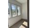 Bright bedroom with wood floors and big windows that let in natural light at 1818 Orangeburg St, North Charleston, SC 29405
