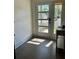Bright entryway featuring a glass-paneled door, tile flooring, and natural light, creating a welcoming ambiance at 1818 Orangeburg St, North Charleston, SC 29405