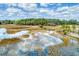 Overhead shot showcasing the serene marsh scenery and waterway, perfect for nature enthusiasts at 1818 Orangeburg St, North Charleston, SC 29405