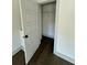 View of a walk-in closet with hardwood flooring and white wire shelving at 1818 Orangeburg St, North Charleston, SC 29405